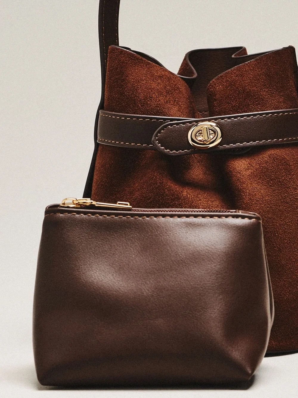 Anthropologie Brown faux suede bucket bag with leather strap and leather pouch
